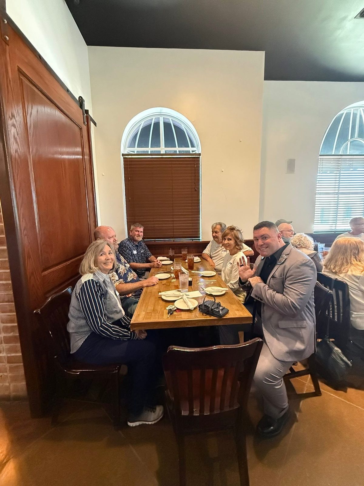 Nick Pappas with neighbors at a community lunch.