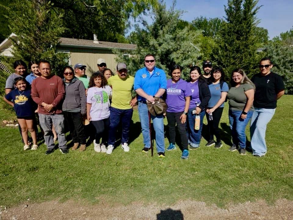Nick Pappas with neighbors at an outdoor community gathering in Denton County.